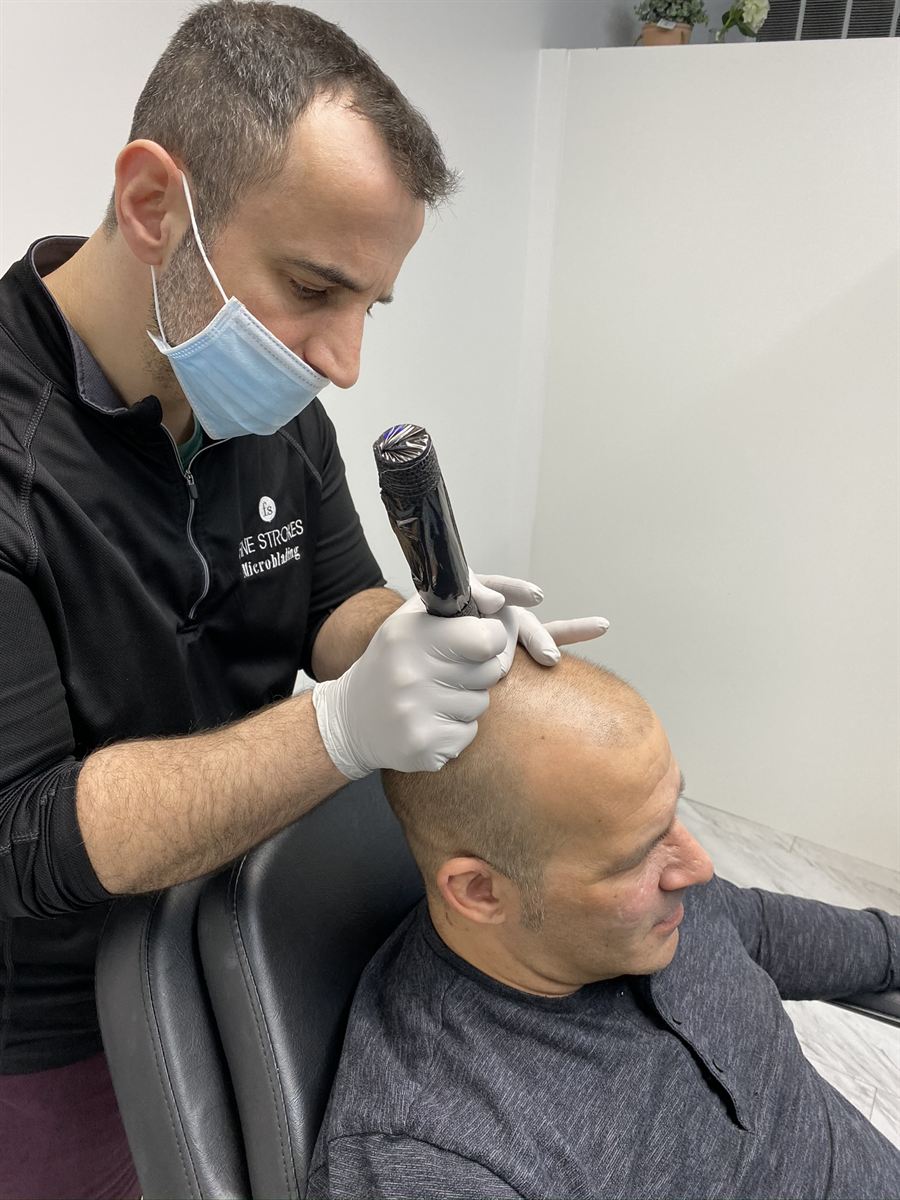 PMU artist performing a pigmentation procedure in a licensed Michigan studio